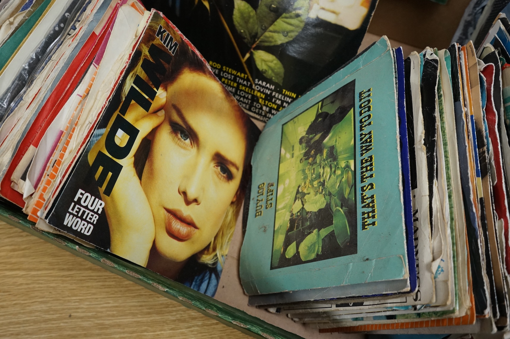 A collection of LP record albums, 12” singles and 7” singles, artists include; Dire Straits, Queen, ELO, Michael Jackson, etc.